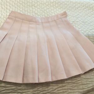 Mini light pink tennis skirt